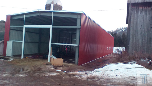 Customer is using this 40x125x20 steel building for farm equipment storage and feed