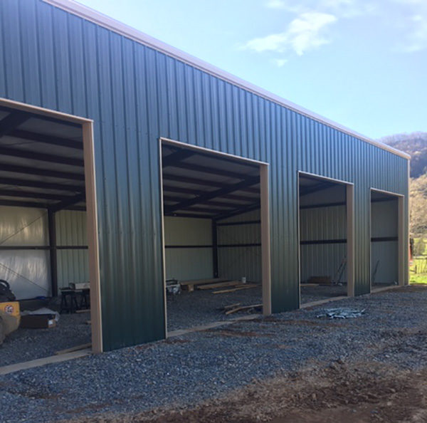 Prefabricated steel farm equipment storage buildings for storage and repair